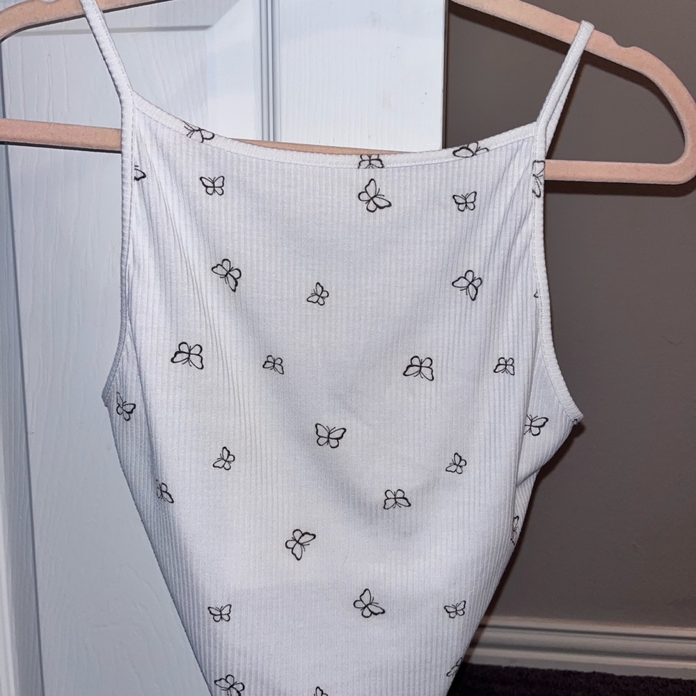 medium white crop top and black butterflies